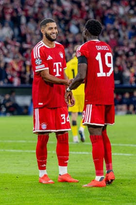Ismael Saibari (FC Bayern Munich, 34) congratulates Alphonso Davies (FC Bayern Munich, 19) on his goal to make it 3–0 for Germany, FC Bayern Munich vs. FK Bodo Glimt, soccer, UEFA Champions League, group stage, Matchday 1, 2026–2027 season, September 10, 2026. DFL and DFB regulations prohibit any use of photographs as image sequences and or quasi-video. Photo: HMB Media, Heike Feiner Copyright: HMBxMedia HeikexFeiner