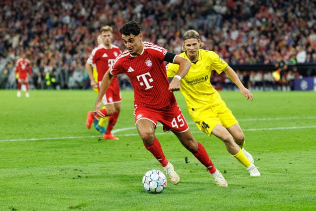 Aleksandar Pavlovic, 45, FC Bayern Munich, and Ulrik Saltnes, 14, FK Bodo Glimt, during the match between FC Bayern Munich and FK Bodo Glimt, soccer, men s, UEFA Champions League, 2026–2027, Matchday 1 on September 10, 2026, in Munich, Allianz Arena, Bavaria, Germany