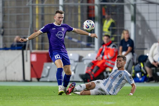 Battle for the Ball: Tackle between Lukas Ramser (TSV 1847 Schwaben Augsburg, 10) and Florian Niederlechner (TSV 1860 Munich, 07 GER), TSV 1860 Munich vs. TSV Schwaben Augsburg, Soccer, Bavarian Regional League, Matchday 8, 2026–2027 season, September 11, 2026 DFL DFB regulations prohibit any use of photographs as image sequences and or quasi-video. Photo: HMB Media, Heike Feiner Copyright: HMBxMedia HeikexFeiner
