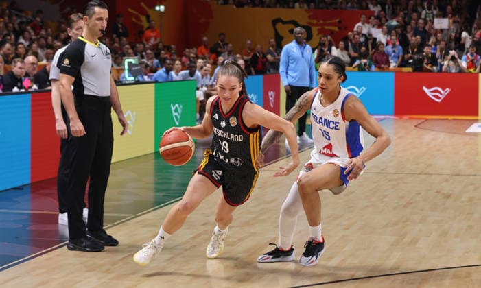 Britta Daub with the ball, Gabby Williams, head-to-head, game action, sports, basketball, FIBA World Cup, Women s World Championship, World Cup semifinals, 2026–2027 season, December 9, 2026, France (FRA) vs. DBB Germany (GER)