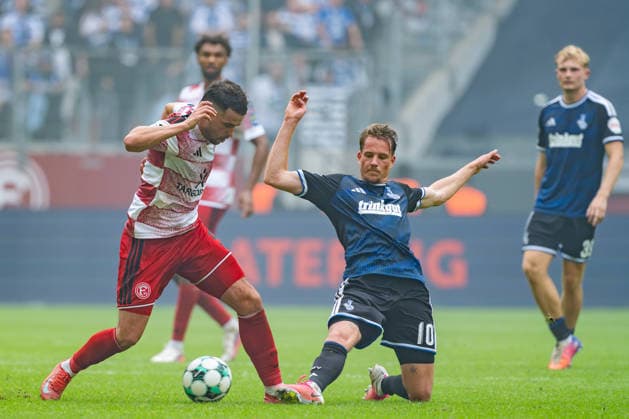 Yassine Bouchama (Fortuna Düsseldorf, 05) is tackled by Christian Viet (MSV Duisburg, 10), a tackle during the Fortuna Düsseldorf vs. MSV Duisburg match, soccer, 3. Liga, Matchday 5, 2026–27 season, September 12, 2026, DFL regulations prohibit any use of photographs as image sequences and or quasi-video. Fortuna Düsseldorf vs. MSV Duisburg, soccer, 3. Liga, Matchday 5, 2026–27 season, September 12, 2026, Düsseldorf Copyright: xEibner-Pressefoto LukasxBaldygax EP_LBA