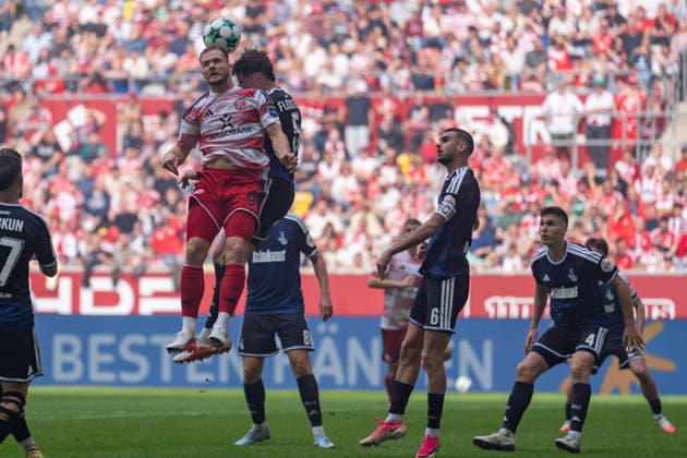 Eric Hottmann of Fortuna Düsseldorf, No. 09, and Tobias Fleckstein of MSV Duisburg, No. 05, in a header duel; Rasim Bulic of MSV Duisburg, No. 06, and Martin Ens of MSV Duisburg, 04 watching Fortuna Düsseldorf vs. MSV Duisburg, soccer, 3rd Division, Matchday 05, 2026–27 season, September 12, 2026, DFL regulations prohibit any use of photographs as image sequences and or quasi-video. Fortuna Düsseldorf vs. MSV Duisburg, soccer, 3. Liga, Matchday 5, 2026–27 season, September 12, 2026, Düsseldorf Copyright: xEibner-Pressefoto LukasxBaldygax EP_LBA