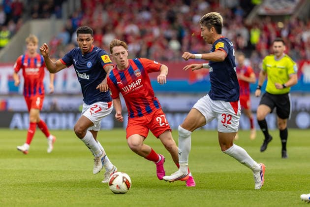 Tackle: Michael Heule (1 FC Heidenheim), 27; Ikem Ugoh (Holstein Kiel), 27; Hiroki Sekine (Holstein Kiel), 32, GER, 1 FC Heidenheim vs. Holstein Kiel, Soccer, 2. Bundesliga, Matchday 5, 2026–2027 season, September 13, 2026, DFL and DFB regulations prohibit any use of photographs as image sequences and or quasi-video, GER, 1 FC Heidenheim vs. Holstein Kiel, Soccer, 2. Bundesliga, Matchday 5, 2026–2027 Season, September 13, 2026, Heidenheim Copyright: xEibner-Pressefoto JanixPlessx EP_JPL
