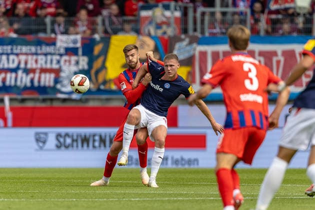 Fierce Tackle: Julian Niehues (1 FC Heidenheim), 16 Phil Harres (Holstein Kiel), 19, GER, 1 FC Heidenheim vs. Holstein Kiel, Soccer, 2. Bundesliga, Matchday 5, 2026–2027 Season, September 13, 2026, DFL and DFB regulations prohibit any use of photographs as image sequences and or quasi-video, GER, 1 FC Heidenheim vs. Holstein Kiel, Soccer, 2. Bundesliga, Matchday 5, 2026–2027 Season, September 13, 2026, Heidenheim Copyright: xEibner-Pressefoto JanixPlessx EP_JPL