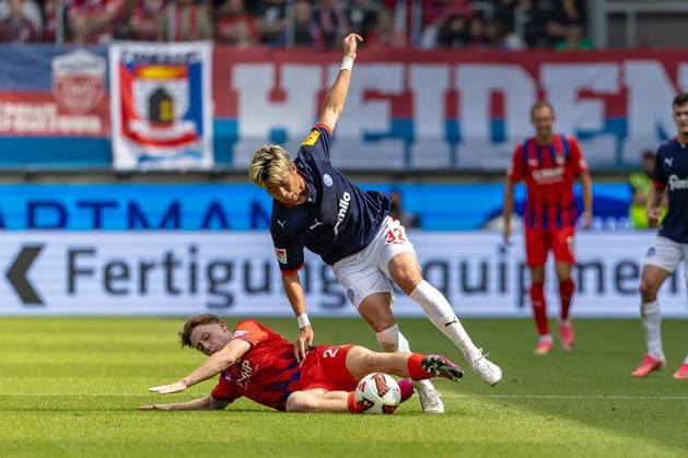 Tough tackle by Michael Heule (1 FC Heidenheim, 27) on Hiroki Sekine (Holstein Kiel, 32), GER, 1 FC Heidenheim vs. Holstein Kiel, Soccer, 2. Bundesliga, Matchday 5, 2026–2027 Season, September 13, 2026, DFL and DFB regulations prohibit any use of photographs as image sequences and or quasi-video, GER, 1 FC Heidenheim vs. Holstein Kiel, Soccer, 2. Bundesliga, Matchday 5, 2026–2027 Season, September 13, 2026, Heidenheim Copyright: xEibner-Pressefoto JanixPlessx EP_JPL