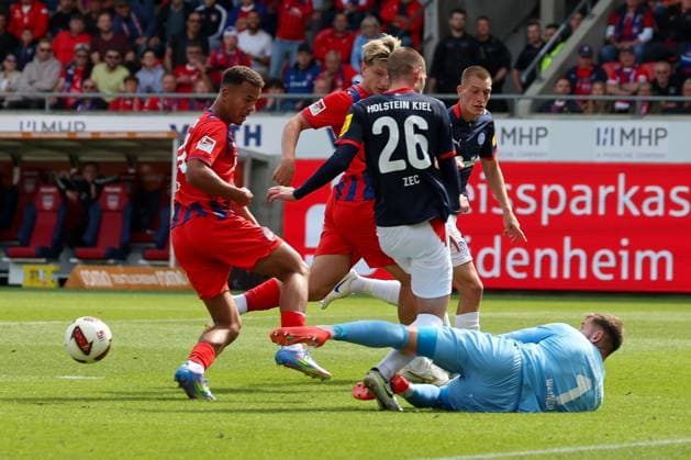 Timon Weiner 1 (Holstein Kiel) and Marcel Costly 24 (1. FC Heidenheim 1846) in action, with David Zec 26 (Holstein Kiel), 1. FC Heidenheim 1846 vs. Holstein Kiel, soccer, DFL, 2. Bundesliga, 2026–2027 season, first half of the season, Matchday 5, September 13, 2026, Heidenheim, Baden-Württemberg, Germany Copyright: xkolbert-press MartinxAgüerax