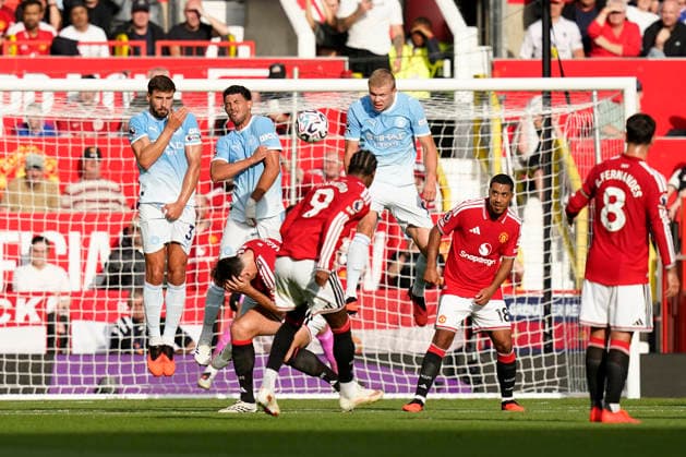 Manchester, England, 13th September 2026. Marcus Rashford of Manchester United, ManU hits the post with this freekick during the Manchester United vs Manchester City Premier League match at Old Trafford, Manchester. Picture credit should read: Andrew Yates Sportimage EDITORIAL USE ONLY. No use with unauthorised audio, video, data, fixture lists, club league logos or live services. Online in-match use limited to 120 images, no video emulation. No use in betting, games or single club league player publications. SPI_049_AY_MAN_UTD_MAN_CITY SPI-4993-0041