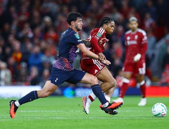 Rio Ngumoha of Liverpool and Marcos Senesi of Tottenham Hotspur Liverpool v Tottenham Hotspur, EFL Carabao Cup, Football, Anfield, UK - 15 Sep 2026Liverpool Anfield United Kingdom EDITORIAL USE ONLY No use with unauthorised audio, video, data, fixture lists, club league logos or live services. Online in-match use limited to 120 images, no video emulation. No use in betting, games or single club league player publications. Copyright: xMattxWest Shutterstockx 17152603al
