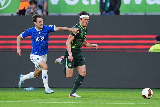 September 18, 2026, xydrx, Men s, Soccer, 2. Bundesliga, VfL Wolfsburg vs. SV Darmstadt 98, 2026–2027 season, Volkswagen Arena, Christopher Lannert (SV Darmstadt 98), No. 28 in a tackle against Fabian Reese (VfL Wolfsburg), No. 11. DFB regulations prohibit any use of photographs as image sequences and or quasi-video. Copyright: HMBxMedia YannisxDreimann