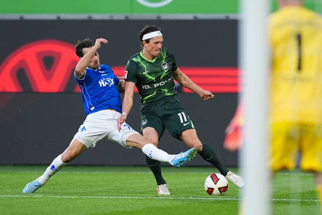 September 18, 2026, xydrx, Men s, Soccer, 2. Bundesliga, VfL Wolfsburg vs. SV Darmstadt 98, 2026–2027 season, Volkswagen Arena, Christopher Lannert (SV Darmstadt 98), No. 28 in a tackle against Fabian Reese (VfL Wolfsburg), No. 11. DFB regulations prohibit any use of photographs as image sequences and or quasi-video. Copyright: HMBxMedia YannisxDreimann