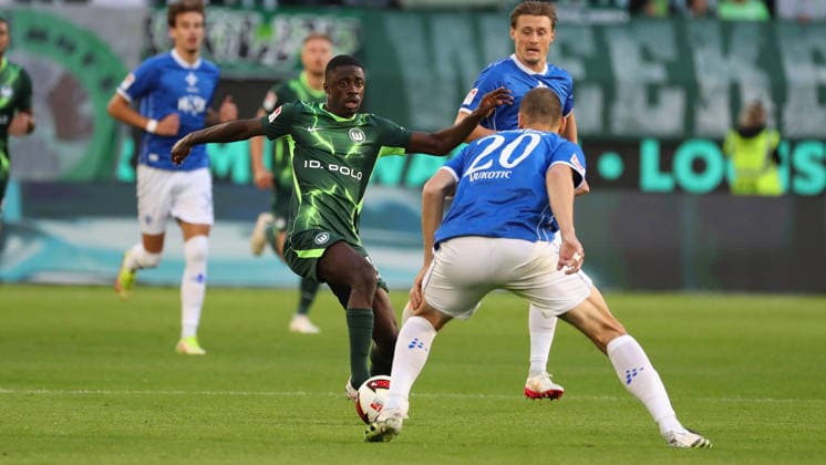 VfL vs. Darmstadt, 2. Bundesliga Wolfsburg, September 18, 2026, Soccer, Men s, 2. Bundesliga, 2026–2027 Season, VfL Wolfsburg vs. SV Darmstadt 98, Saël Kumbedi (VfL Wolfsburg), Aleksander Vukotic (SV Darmstadt 98). DFL and DFB regulations prohibit any use of photographs as image sequences and or quasi-video. Volkswagen Arena, Lower Saxony, Germany