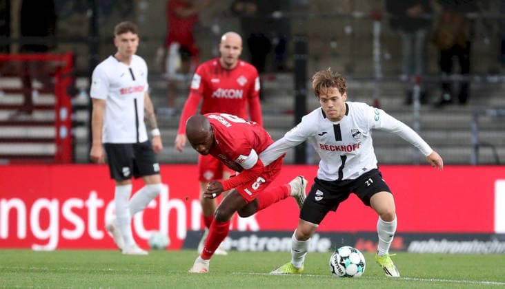 September 18, 2026, xfsx, Men s, Soccer, 2026–2027 Season, 3rd Division, Matchday 7: SC Verl vs. FC Würzburger Kickers; from left: David Kinsombi (FC Würzburger Kickers), Mika Clausen (SC Verl); Verl Sportclub Arena, North Rhine-Westphalia, Germany