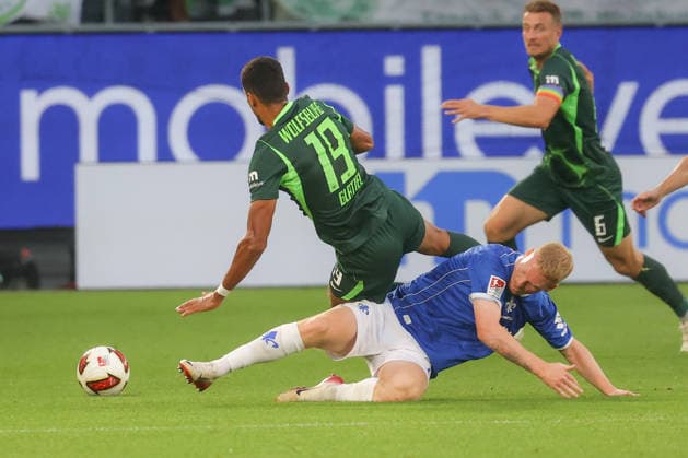 September 18, 2026, xgox, Soccer, 2. Bundesliga, VfL Wolfsburg vs. SV Darmstadt 98, Robert Glatzel (Wolfsburg), 19, Kai Klefisch Darmstadt, 17, tackle, duel, battle, DFL DFB REGULATIONS PROHIBIT ANY USE OF PHOTOGRAPHS AS IMAGE SEQUENCES AND OR QUASI-VIDEO Wolfsburg