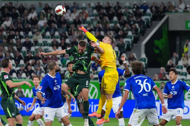 September 18, 2026, xydrx, Men s, Soccer, 2. Bundesliga, VfL Wolfsburg vs. SV Darmstadt 98, 2026–2027 season, Volkswagen Arena, Hauke Wahl (VfL Wolfsburg), No. 6 in a tackle against Marcel Schuhen (SV Darmstadt 98), 1. DFB regulations prohibit any use of photographs as image sequences and or quasi-video Copyright: HMBxMedia YannisxDreimann