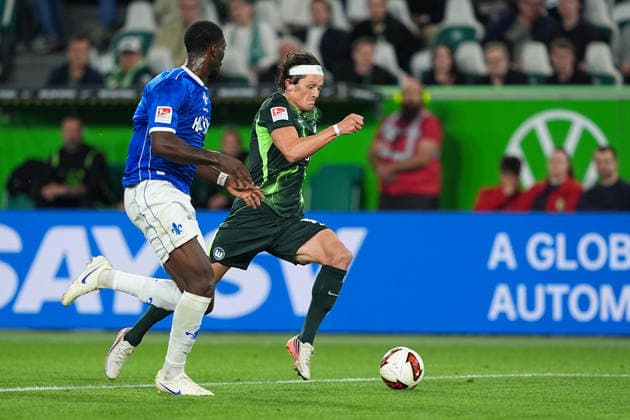 September 18, 2026, xydrx, Men s, Soccer, 2. Bundesliga, VfL Wolfsburg vs. SV Darmstadt 98, 2026–2027 season, Volkswagen Arena: Patric Pfeiffer (SV Darmstadt 98), No. 6 in a tackle against Fabian Reese (VfL Wolfsburg), No. 11. DFB regulations prohibit any use of photographs as image sequences and or quasi-video. Copyright: HMBxMedia YannisxDreimann