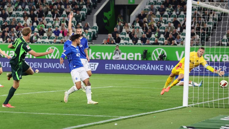 VfL vs. Darmstadt, 2. Bundesliga Wolfsburg, September 18, 2026, Soccer, Men s, 2. Bundesliga, 2026–2027 Season, VfL Wolfsburg vs. SV Darmstadt 98—Alexander Bernhardsson of VfL Wolfsburg scores the goal to make it 3–1, Goalkeeper Marcel Schuhen, SV Darmstadt 98; Raoul Petretta, SV Darmstadt 98. DFL and DFB regulations prohibit any use of photographs as image sequences and or quasi-video. Volkswagen Arena, Lower Saxony, Germany