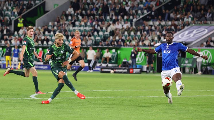 VfL vs. Darmstadt, 2. Bundesliga Wolfsburg, September 18, 2026, Soccer, Men s, 2. Bundesliga, 2026–2027 Season, VfL Wolfsburg vs. SV Darmstadt 98 Muhammed Damar of VfL Wolfsburg scores the goal to make it 4–1, Patric Pfeiffer, SV Darmstadt 98. DFL and DFB regulations prohibit any use of photographs as image sequences and or quasi-video. Volkswagen Arena, Lower Saxony, Germany