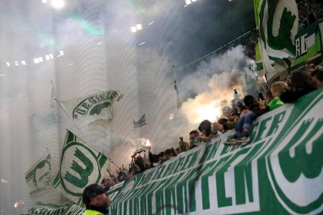 September 18, 2026, xgox, Soccer, 2. Bundesliga, VfL Wolfsburg vs. SV Darmstadt 98, symbolic photo, symbolic image, symbolic fans, spectators, audience, North Stand (Nordkurve) pyrotechnics, pyrotechnics, flares, smoke, fireworks. DFL and DFB regulations prohibit any use of photographs as image sequences and or quasi-video. Wolfsburg