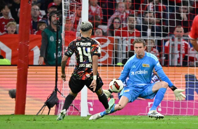 Penalty area play, Goalmouth action, shot on goal, scoring chance, chip shot by Luis Diaz, FC Bayern Munich (FCB) 14 vs. goalkeeper Frederik Roennow, 1. FC Union Berlin (FCU) 01, FC Bayern Munich (FCB) vs. 1. FC Union Berlin (FCU), September 18, 2026, DFL Regulations ProHIBIT ANY USE OF PHOTOGRAPHS AS IMAGE SEQUENCES AND OR QUASI-VIDEO FC Bayern Munich FCB vs. 1. FC Union Berlin FCU