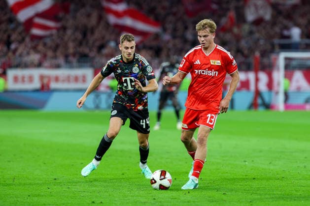 September 18, 2026, GER, Soccer, Men s, 1. Bundesliga, 2026–2027 Season, Matchday 4, FC Bayern Munich vs. 1. FC Union Berlin Josip Stanisic, FC Bayern Munich 44 (left), Andras Schäfer, 1. FC Union Berlin 13 (right), DFB and DFL regulations prohibit any use of photographs as image sequences and or quasi-video. Munich, Allianz Arena, Bayern, Germany Copyright: xNordphoto Schneiderx
