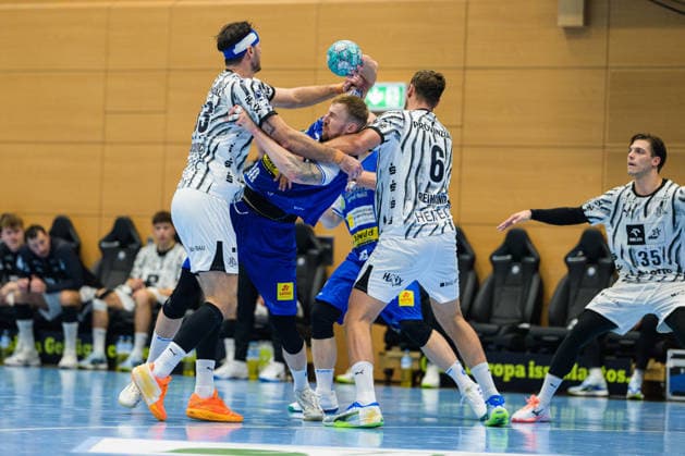 Dominik Solak, ThSV Eisenach, 30; Harald Reinkind, THW Kiel, 06; Veron Nacinovic, THW Kiel, 93; Domen Makuc, THW Kiel, 35 GER, ThSV Eisenach vs. THW Kiel, 1st Opel Handball Bundesliga, Handball, Matchday 5, 2026–2027 season, 8:00 p.m., September 18, 2026 GER, ThSV Eisenach vs. THW Kiel, 1st Opel Handball Bundesliga, Handball, Matchday 5, 2026–2027 season, 8:00 p.m., September 18, 2026, Eisenach Copyright: xMartinxHerbstx