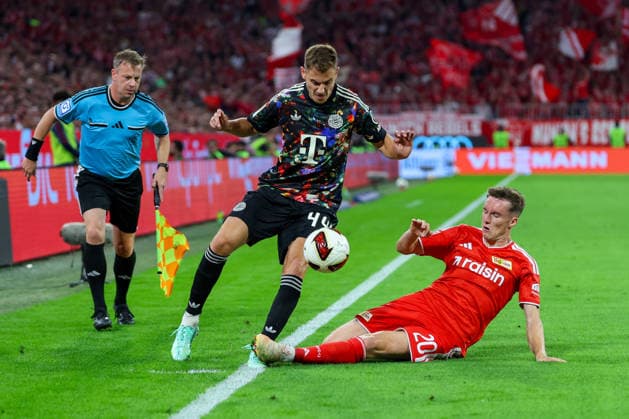 September 18, 2026, GER, Soccer, Men s, 1. Bundesliga, 2026–2027 Season, Matchday 4, FC Bayern Munich vs. 1. FC Union Berlin Josip Stanisic FC Bayern Munich 44, left Michel Aebischer 1. FC Union Berlin 20, right DFB DFL regulations prohibit any use of photographs as image sequences and or quasi-video Munich Allianz Arena Bayern Germany Copyright: xNordphoto Schneiderx