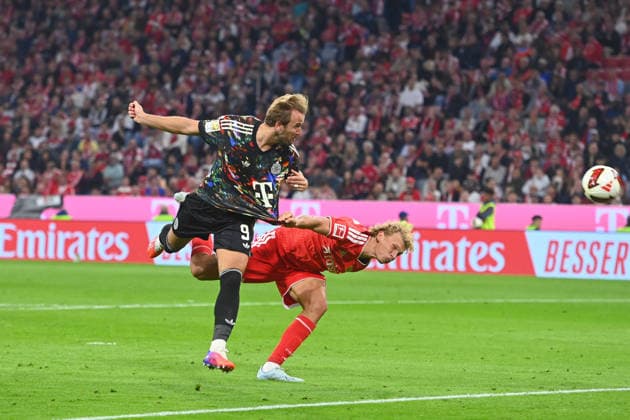 Goal by Harry KANE of Bayern Munich on a header, action, tackle against Leopold QUERFELD of Union Berlin to make it 4–0, penalty area play, soccer, Bundesliga Season 2026–2027, Matchday 4, Matchday 04, FC Bayern Munich 1 FC Union Berlin on September 18, 2026, Allianz Arena