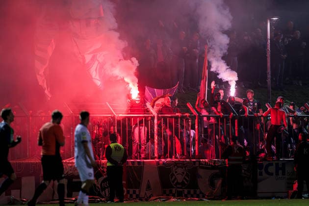 September 18, 2026, xkwix, Soccer, Regionalliga West, SV Rödinghausen vs. FC Gütersloh, Häcker Wiehenstadion, Matchday 9, 2026–2027 season: Pyrotechnics in the visitors section after Patrik Twardzik scored the 0–1 goal for FC Gütersloh. DFB regulations prohibit any use of photographs as image sequences and or quasi-video. Photo: xKamilxWilkowskixPressefotoKochx, North Rhine-Westphalia, Germany
