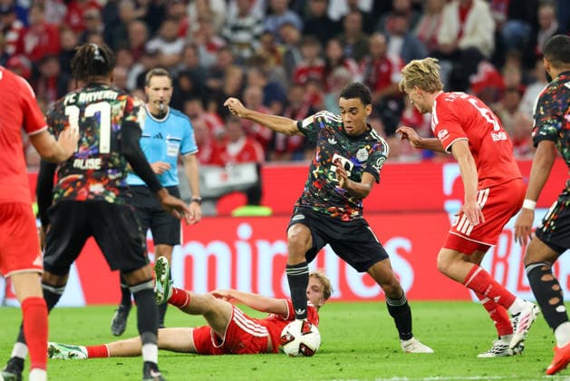 Jamal Musiala, FC Bayern Munich, No. 10, vs. Leopold Querfeld, 1. FC Union Berlin, No. 14, and Aljoscha Kemlein, 1. FC Union Berlin, 06, GER, FC Bayern Munich vs. 1 FC Union Berlin, Soccer, Bundesliga, Matchday 4, 2026–2027 Season, September 18, 2026, DFL and DFB regulations prohibit any use of photographs as image sequences and or quasi-video, GER, FC Bayern Munich vs. 1. FC Union Berlin, soccer, Bundesliga, Matchday 4, 2026–2027 season, September 18, 2026, Munich Copyright: xEibner-Pressefoto JennixMaulx EP_JML