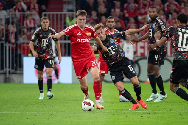 GER, Bavaria, Munich, Soccer, FC Bayern Munich vs. 1. FC Union Berlin, at the Allianz Arena, Munich, Bundesliga, Matchday 4, September 18, 2026, From left: Michel Aebischer (1. FC Union Berlin), 20, Joshua Kimmich (FC Bayern Munich), 6, in a tackle for the ball. DFL and DFB regulations prohibit any use of photographs as image sequences and or quasi-video, Copyright: HMB-Media MichaelxNibel