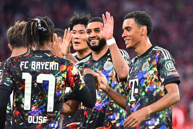 Collective goal celebration for Michael OLISE of Bayern Munich with Minjae KIM of FC Bayern Munich, Ismael SAIBARI of Bayern Munich, Jamal MUSIALA of Bayern Munich, Celebration, Joy, Excitement, Action, Soccer, Bundesliga Season 2026–2027, Matchday 4, Matchday 04, FC Bayern Munich 1–7 FC Union Berlin on September 18, 2026, Allianz Arena