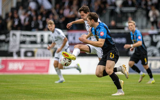 Soccer, 2026–2027 Season, Regionalliga West, September 19, 2026, Matchday 9, Men s, 1 FC Bocholt (white) vs. SC Wiedenbrück (black), Lennart Garlipp (1 FC Bocholt), Maik Amedick (SC Wiedenbrück), Bocholt Stadion am Huenting, Germany 260919_fb_1fc-bocholt_sc-wiedenbrueck_58979