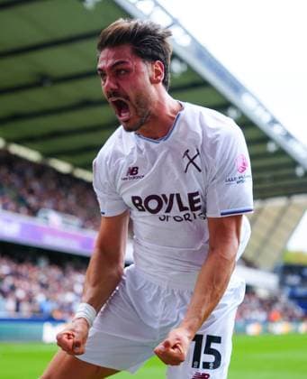 Konstantinos Mavropanos of West Ham United celebrates scoring a goal after making it 2-2 Millwall v West Ham United, EFL Sky Bet Championship, Football, The Den, London, UK - 19 Sep 2026London The Den United Kingdom EDITORIAL USE ONLY No use with unauthorised audio, video, data, fixture lists, club league logos or live services. Online in-match use limited to 120 images, no video emulation. No use in betting, games or single club league player publications. Copyright: xJavierxGarcia Shutterstockx 17158528bp