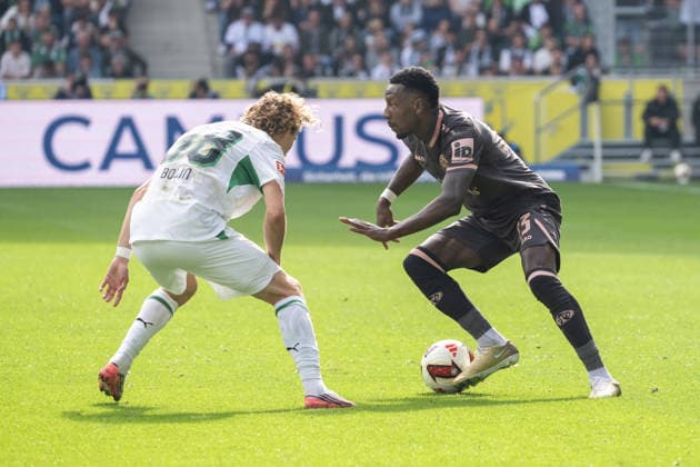 Tackle between Hugo Bolin of Borussia Mönchengladbach, 38, and Sheraldo Becker of 1. FSV Mainz 05, 23; Borussia Mönchengladbach vs. 1. FSV Mainz 05, Soccer, Bundesliga, Matchday 4, 2026–2027 season, September 19, 2026. DFL and DFB regulations prohibit any use of photographs as image sequences and or quasi-video. Borussia Mönchengladbach vs. 1. FSV Mainz 05, soccer, Bundesliga 1, Matchday 04, 2026–2027 season, September 19, 2026, Mönchengladbach Copyright: xEibner-Pressefoto ThomasxHaeslerx EP_THR