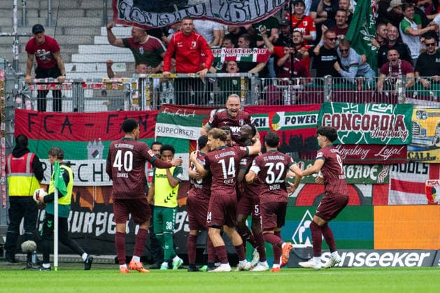September 19, 2026, Germany, Soccer, Men s, 1. Bundesliga, 2026–2027 Season, Matchday 4, SV Werder Bremen vs. FC Augsburg Noahkai Banks (FC Augsburg, 40), Marius Wolf (FC Augsburg, 27), Yannik Keitel (FC Augsburg, 14), Fabian Rieder (FC Augsburg, 32), and the team celebrate the goal that made it 0–2, scored by Calvin Brackelmann (FC Augsburg, 02). DFB and DFL regulations prohibit any use of photographs as image sequences and or quasi-video. Bremen Weserstadion, Bremen, Germany Copyright: xNordphoto Memmlerx