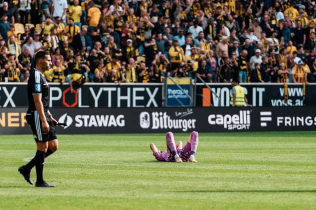 Germany Soccer 3rd Division 2026–2027, Matchday 7: Alemannia Aachen vs. Fortuna Düsseldorf at Tivoli Aachen—defeat, sadness, fans, devastated, disappointment, heads hanging low, emotions, Louis Lord of Fortuna Düsseldorf, 22 after the final whistle, on the ground Copyright: xThiemoxRudolphx