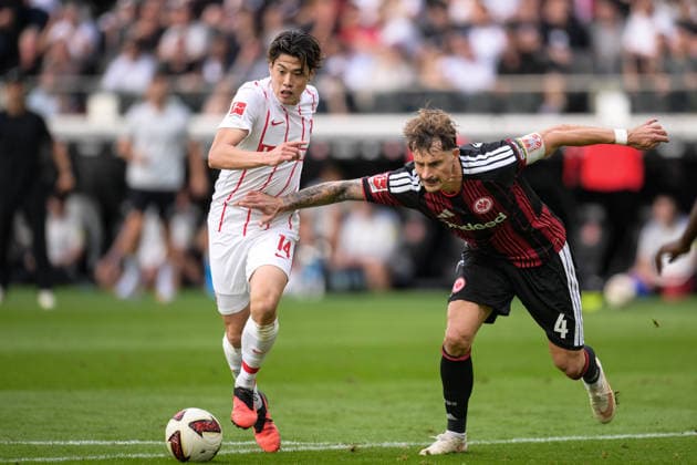 Soccer, Bundesliga 1, 20260919, SG Eintracht Frankfurt vs. SC Freiburg; Photo 3: 14, Robin KOCH (Frankfurt), 4, tackle for the ball in the penalty area, Frankfurt, Deutsche Bank Park, Hesse, Germany Copyright: Passion2Press MarkusxFischerx