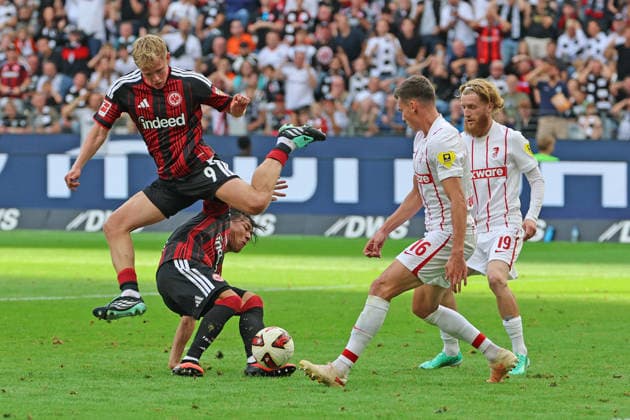 Jonathan Burkhardt, Jonathan Michael Jonny Burkardt, Jonny Burkardt (Eintracht Frankfurt), No. 9, blocks Keita Kosugi (Eintracht Frankfurt), No. 26, from taking a shot; Eintracht Frankfurt vs. SC Freiburg, Bundesliga, BL, 2026–2027 season, Game 4, September 19, 2026, Frankfurt, Deutsche Bank Park, Germany