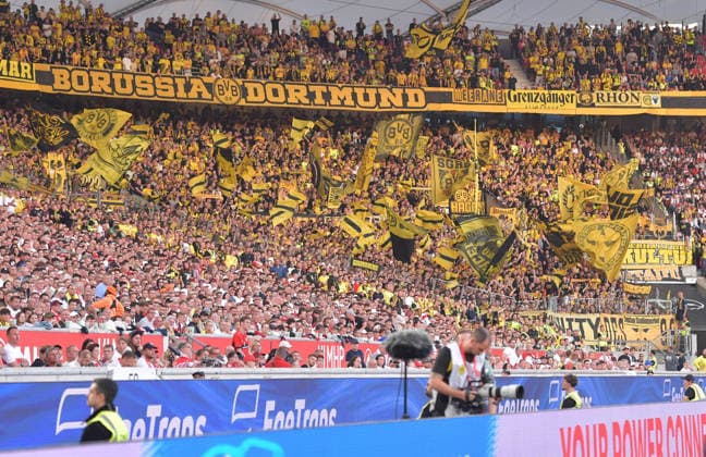 September 19, 2026, xblx, Soccer, Bundesliga 1, VfB Stuttgart vs. Borussia Dortmund, BVB stands, spectators, stadium, fans, stands, bleachers, scarves, banner, posters, flag, flags DFL DFB REGULATIONS PROHIBIT ANY USE OF PHOTOGRAPHS as IMAGE SEQUENCES and or QUASI-VIDEO Stuttgart
