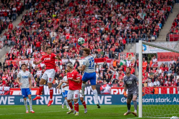 Florian Carstens, FC Hansa Rostock, No. 17, clears the ball with a header after a cross (shown in the photo); Semir Telalovic, Rot-Weiss Essen, No. 17; Marek Janssen, Rot-Weiss Essen, No. 20; Luca Unbehaun, FC Hansa Rostock, 01 Rot-Weiss Essen vs. FC Hansa Rostock, soccer, 3rd Division, Matchday 7, 2026–27 season, September 20, 2026, DFL regulations prohibit any use of photographs as image sequences and or quasi-video; Rot-Weiss Essen vs. FC Hansa Rostock, Soccer, 3rd Division, Matchday 7, 2026–27 Season, September 20, 2026, Essen Copyright: xEibner-Pressefoto LukasxBaldygax EP_LBA