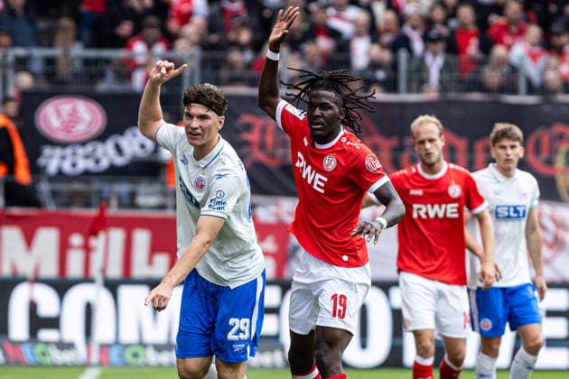 3rd Division, Matchday 7: Rot-Weiss Essen vs. Hansa Rostock, September 20, 2026, Peter Kiedl (Hansa Rostock), 29 Franci Bouebari, Rot-Weiss Essen, 19 3rd Division, Matchday 7: Rot-Weiss Essen vs. Hansa Rostock, Stadion an der Hafenstraße, Essen, September 20, 2026. DFL regulations prohibit any use of photographs as image sequences and or quasi-video Copyright: xBEAUTIFULxSPORTS Buriakovx
