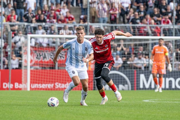 Battle for the Ball: Tackle between Florian Niederlechner (TSV 1860 Munich, No. 7) and Khalid Abu El Haija (1. FC Nuremberg II U23, No. 44, GER), TSV 1860 Munich vs. 1. FC Nuremberg II U23, Soccer, Bavarian Regional League, Matchday 10, 2026–2027 Season, September 20, 2026 DFL DFB REGULATIONS PROHIBIT ANY USE OF PHOTOGRAPHS AS IMAGE SEQUENCES AND OR QUASI-VIDEO Photo: HMB Media, Heike Feiner Copyright: HMBxMedia HeikexFeiner