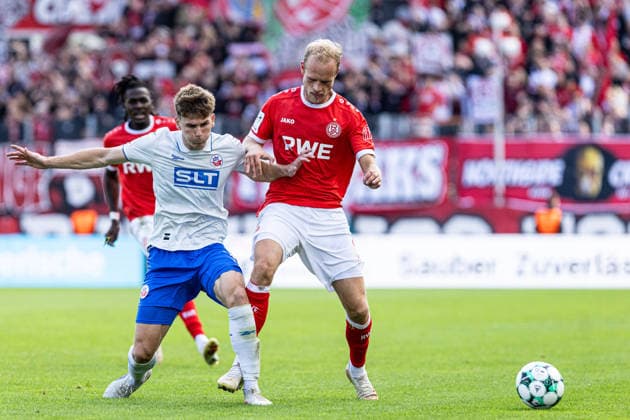 3rd Division, Matchday 7: Rot Weiss Essen vs. Hansa Rostock, September 20, 2026; Florian Bohnert, Hansa Rostock, 3, Lucas Brumme, Rot-Weiss Essen, 14, 3rd Division, Matchday 7: Rot-Weiss Essen vs. Hansa Rostock, Stadion an der Hafenstraße, Essen, September 20, 2026. DFL regulations prohibit any use of photographs as image sequences and or quasi-video. Copyright: xBEAUTIFULxSPORTS Buriakovx