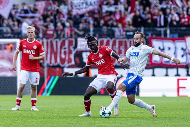3rd Division, Matchday 7: Rot-Weiss Essen vs. Hansa Rostock, September 20, 2026; Franci Bouebari (Rot-Weiss Essen), 19, Benno Dietze, Hansa Rostock, 42 3rd Division, Matchday 7: Rot-Weiss Essen vs. Hansa Rostock, Stadion an der Hafenstraße, Essen, September 20, 2026. DFL regulations prohibit any use of photographs as image sequences and or quasi-video. Copyright: xBEAUTIFULxSPORTS Buriakovx