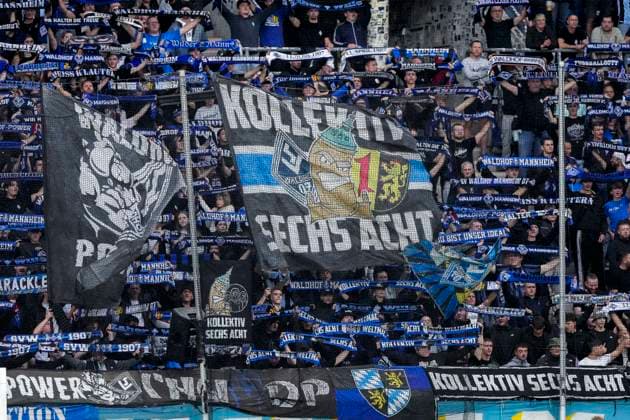 The Ultras of SV Waldhof Mannheim wave their flags in the fan section; home fans, fan block, looking forward to the game; fans, crowd, spectators, mood, atmosphere, stadium, September 20, 2026, Mannheim, Germany, soccer, 3rd Division, SV Waldhof Mannheim vs. SC Preußen Münster, DFB and DFL regulations prohibit any use of photographs as image sequences and or quasi-video xozx