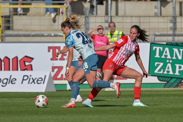 Paulina Tomasiak, Bayer 04 Leverkusen Women, 28, ahead of Maj Schneider, SC Freiburg Women, 15, GER, SC Freiburg vs. Bayer 04 Leverkusen, Women s Soccer, Bundesliga, Matchday 5, 2026–2027 Season, September 20, 2026 DFB regulations prohibit any use of photographs as image sequences and or quasi-video GER, SC Freiburg vs. Bayer 04 Leverkusen, Women’s Soccer, Bundesliga, Matchday 5, 2026–2027 Season, September 20, 2026, Freiburg Copyright: xEibner-Pressefotox EP_THS
