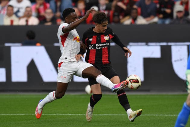 Afonso Moreira, Bayer 04 Leverkusen, 09, in a tackle with Ridle Baku, RB Leipzig 17 GER; Bayer 04 Leverkusen vs. RB Leipzig, soccer, Bundesliga, Matchday 4, 2026–2027 season, September 20, 2026 DFL regulations prohibit any use of photographs as image sequences and or quasi-video GER, Bayer 04 Leverkusen vs. RB Leipzig, Soccer, Bundesliga, Matchday 4, 2026–2027 season, September 20, 2026, Leverkusen Copyright: xEibner-Pressefoto ThomasxThienelx EP_TTL