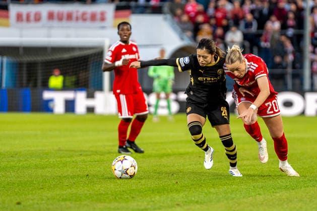 Yui Hasegawa, 25, from Manchester, and Franziska Kett, 20, from Bavaria, in action during the UEFA Women s Champions League match between FC Bayern Munich and Manchester City on September 22, 2026, at uhlsport PARK in Unterhaching, Bavaria, Germany