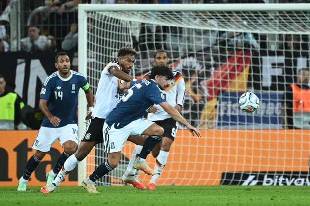 September 27, 2026, xemx, Soccer UEFA Nations League, Germany vs. Greece, Bambase Conte, German National Soccer Team (DFB), Thanasis Androutsos, Greece, tackle, action, battle for the ball, Augsburg