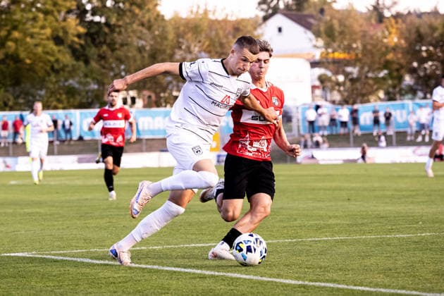 TSG Balingen vs. SSV Ulm 1846 Soccer, State Cup, WFV Cup, Round of 16, BIZERBA ARENA Balingen, September 30, 2026, from left: Simun Birkic, SSV Ulm 1846 Soccer, 16, Maxim Schmalz TSG Balingen Soccer, 17 TSG Balingen vs. SSV Ulm 1846 Soccer, State Cup, WFV Cup, Round of 16, BIZERBA ARENA Balingen, September 30, 2026; Photo by Lucca Fundel, Balingen, BIZERBA ARENA, Baden-Württemberg, Germany